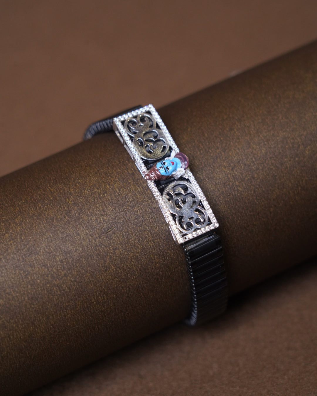 Elegant Black Bracelet Watch with Silver Filigree Design & Artistic Motif
