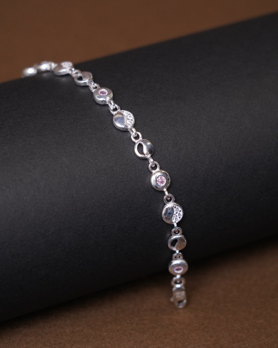 Elegant Silver Bracelet with Pink Stone Accents (7 Inch)