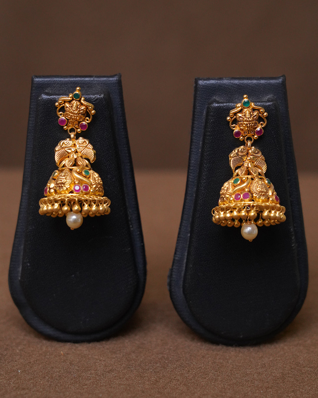 Antique Gold Jhumka Earrings with Ruby, Emerald Stones & Pearl Drop