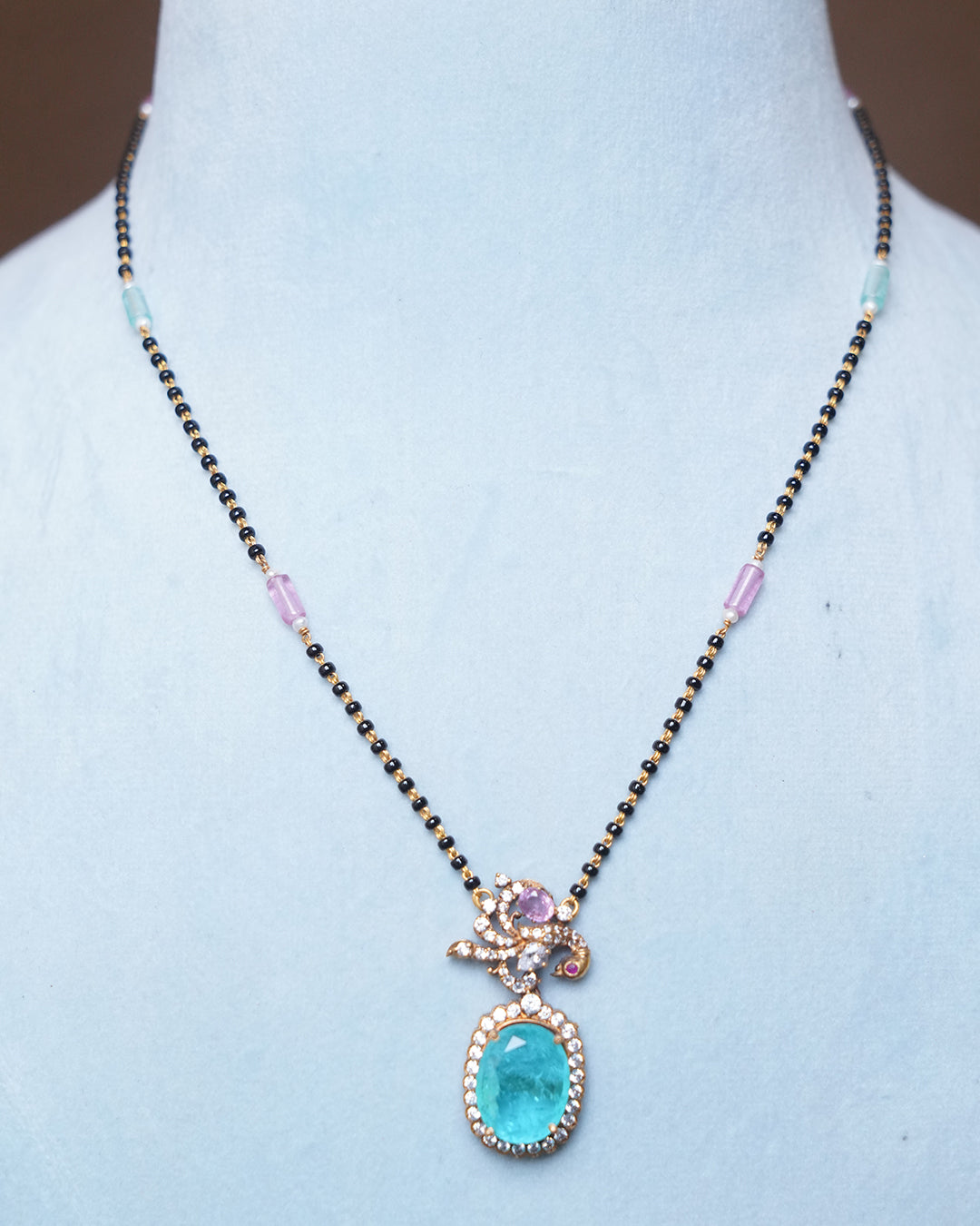 Elegant Gold Mangalsutra Necklace with Aqua Blue Stone Pendant